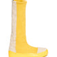 LOCO ONE REBOOT COLLECTION.  BOOTS RESET YELLOW.  Sock style boots. The upper and lining are made of stretchy rib in yellow color. The toe cap, the heel counter and all the back side of the boot are reinforced and made of cracked style cotton. The soles are glued and stitched, featuring a coat of rustic finish of yellow liquid rubber.