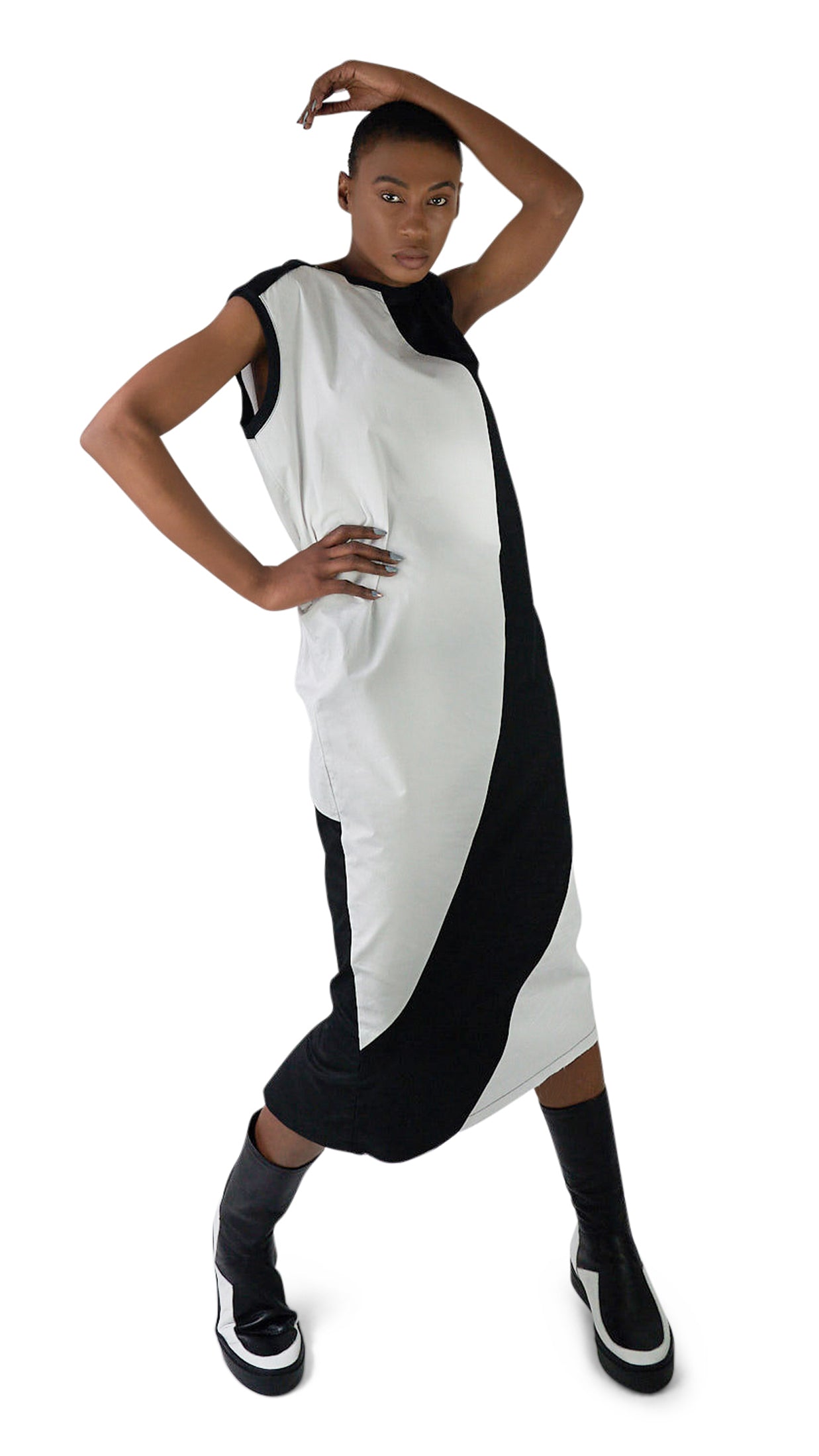 LOCO ONE ACHROMATIC COLLECTION.  DESIGN NUMERO 02.  Unisex dress made with natural materials only. Main composition is COTTON with neckline and sleeves details made of BAMBOO. Asymmetrical cuts, Futuristic look. Raw finishes on the front hem and a split in the back with a detailed, finished hem. Loose fit.