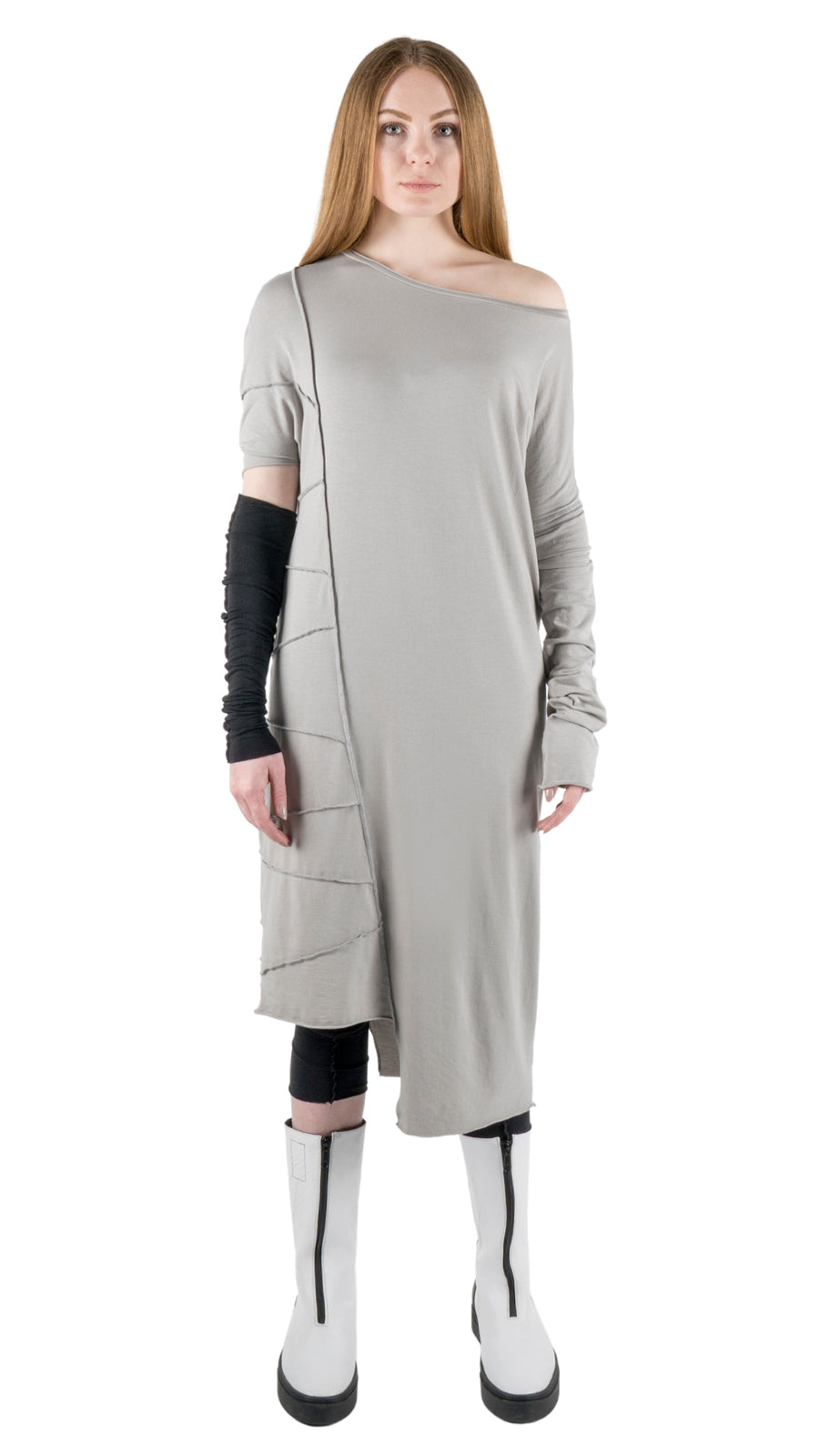LOCO ONE REVOLUTION COLLECTION.  DRESS GRIGIO.  This is a longer version of our LOCO ONE TOP LATERAL with a wider neck line, the left sleeve is loose and extra long, the right side has a wing short sleeve. features the upside down seams all the way down the right side with raw asymmetric hems. This dress is loose fit.