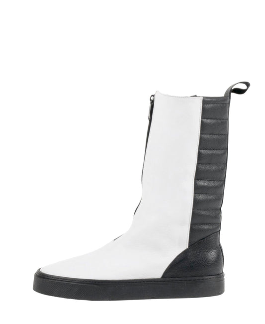 LOCO ONE REVOLUTION COLLECTION.  BOOTS WHITE FRONT.  Made with Genuine Cow Leather (Napa Plena Flor). The front is made with White leather and has a Black zipper. The Black part of the boot has comfortable padding with a black stripe. The lining of the boot is made with soft black leather. The soles are made of with black rubber. Androgynous Style.