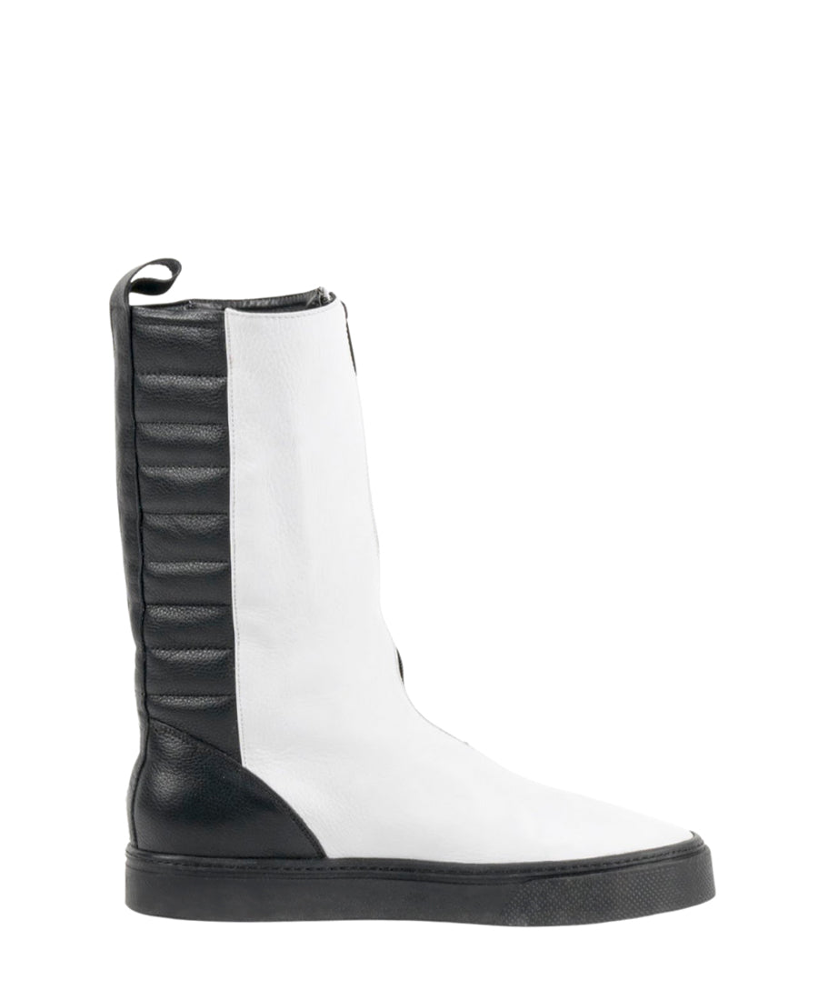 LOCO ONE REVOLUTION COLLECTION.  BOOTS WHITE FRONT.  Made with Genuine Cow Leather (Napa Plena Flor). The front is made with White leather and has a Black zipper. The Black part of the boot has comfortable padding with a black stripe. The lining of the boot is made with soft black leather. The soles are made of with black rubber. Androgynous Style.