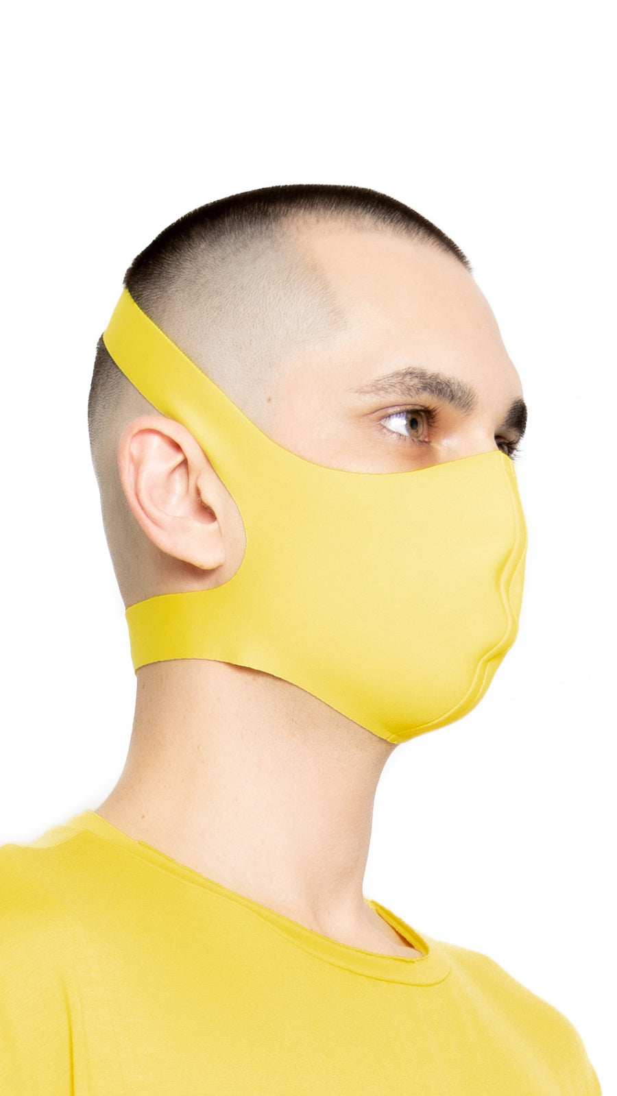 LOCO ONE REBOOT COLLECTION.  MASKA YELLOW.  The Avant-garde LOCO ONE MASKA YELLOW is made of stretchy thin Neoprene. Adjustable on the neck with Velcro for a better fit. You can wash it with soap and water in the comfort of your home every day to keep it nice and clean. The CDC recommends wearing face coverings in public places.